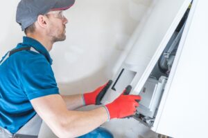 HVAC-technician-performing-repairs